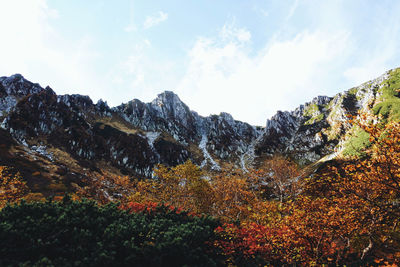 Scenic view of mountains against sky during autumn