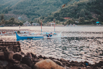 Scenic view of sea against mountains