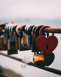 Heart shaped lock in a fence in porto 