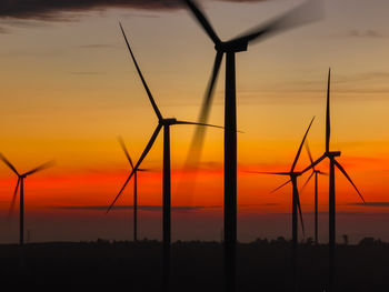 Wind farm landscape against sunset sky. wind energy. wind power. sustainable and renewable energy.