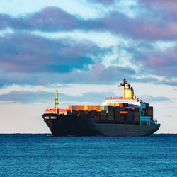 View of ship in sea against sky
