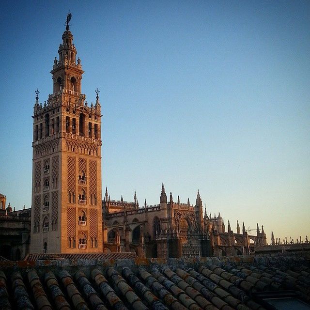 architecture, building exterior, clear sky, built structure, copy space, place of worship, religion, spirituality, history, famous place, travel destinations, church, blue, tourism, travel, international landmark, cathedral, capital cities