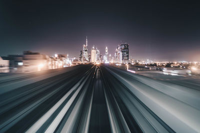 Light trails on bridge at night