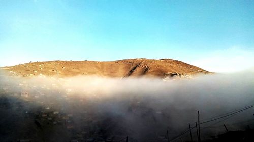 Scenic view of mountains against clear sky