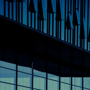 Low angle view of built structure against blue sky