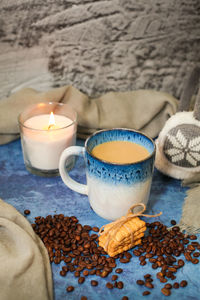 Close-up of tea light candles on table