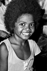 Close-up portrait of smiling girl