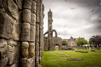 View of old ruin building against cloudy sky