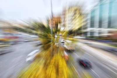 Defocused image of city against sky