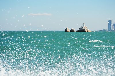 Ship in sea against sky