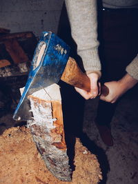 Low section of people standing on tiled floor