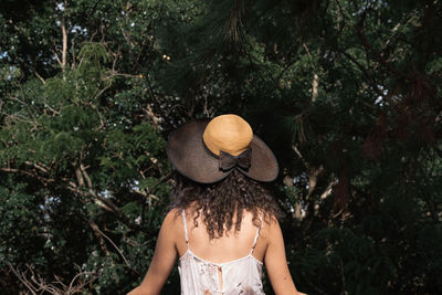 Rear view of woman wearing hat