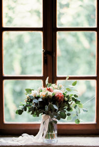 Flower vase on window