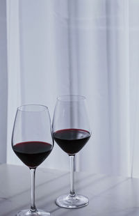 Close-up of wineglass on table