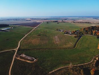 Aerial view of agricultural field against sky