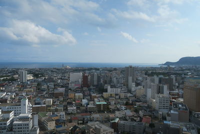 High angle shot of townscape against sky