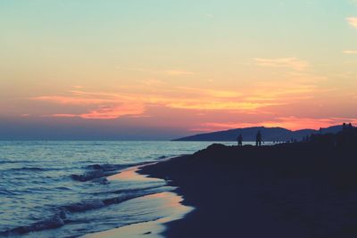 Scenic view of sea at sunset
