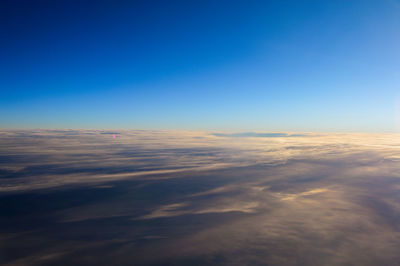 Aerial view of cloudscape against blue sky