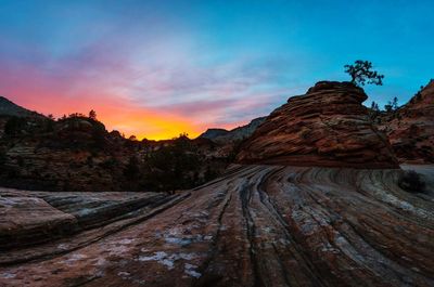 Scenic view of mountain against sky during sunset