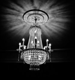 Low angle view of illuminated chandelier