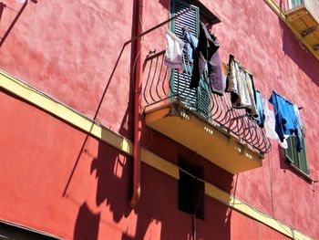 Low angle view of clothes hanging on building