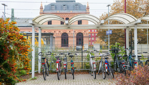 Chairs and table against buildings during autumn