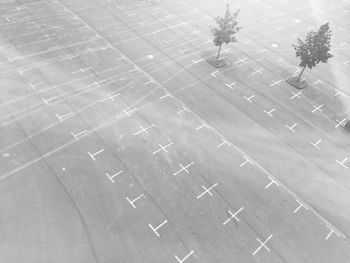 High angle view of markings on empty parking lot