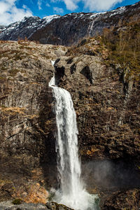 Scenic view of waterfall in forest