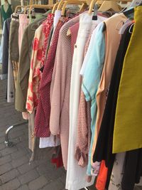 Panoramic view of clothes hanging at market