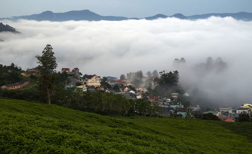 Scenic view of townscape against sky