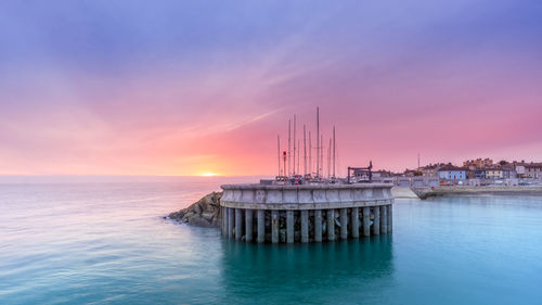 Scenic view of sea against sky during sunset