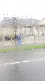 Close-up of water drops on glass