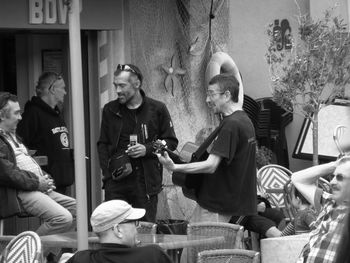 Group of people sitting in restaurant