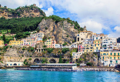 Panoramic view, aerial skyline of small haven of amalfi village with tiny beach  amalfi coast, italy