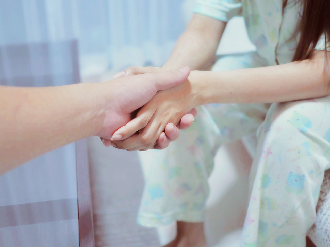 CLOSE-UP OF PEOPLE HANDS ON TABLE