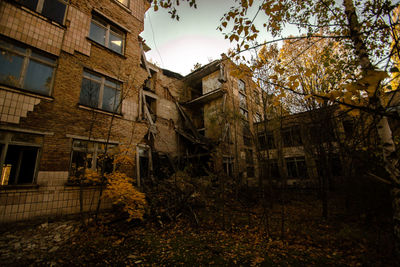 Low angle view of old building against sky