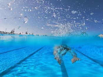 Woman swimming in pool