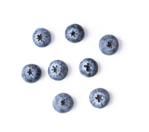 Directly above shot of eggs against white background