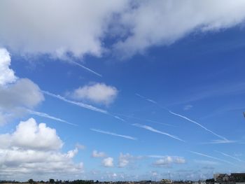 Low angle view of vapor trail in sky