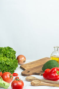 White culinary background with ingredients for making salad