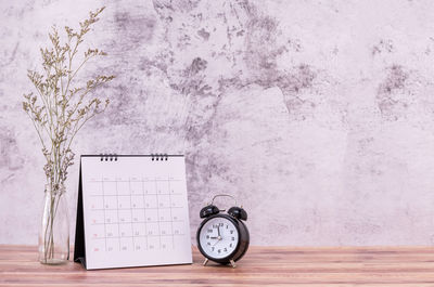 Close-up of clock on wall