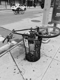 Close-up of bicycle in basket on street