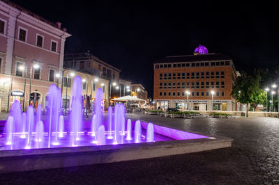 Illuminated building at night