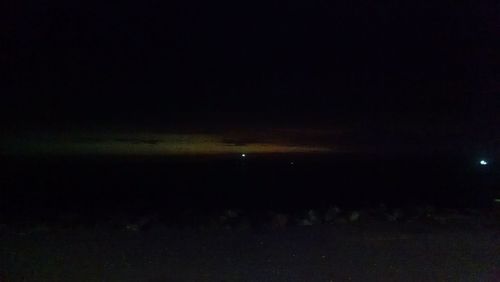 Illuminated moon in sky at night