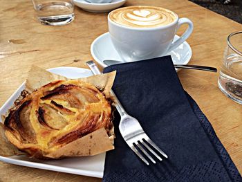 Close-up of coffee cup on table