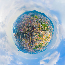 Digital composite image of buildings against sky