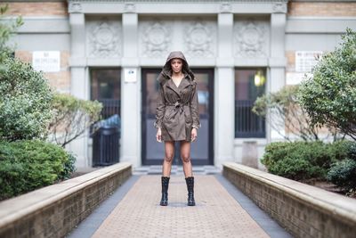 Full length portrait of young woman