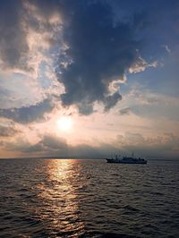 Scenic view of sea against sky during sunset