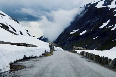 Scenic view of mountains against sky during winter