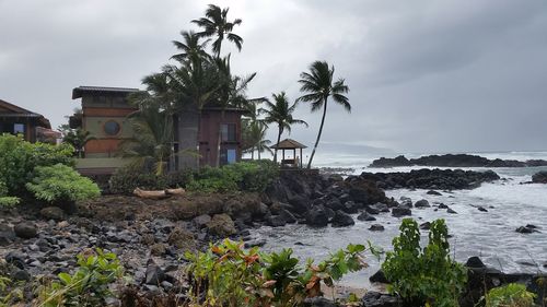 Scenic view of sea against cloudy sky